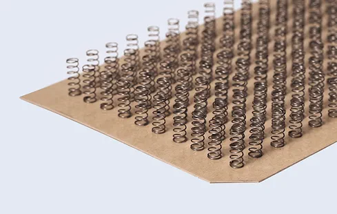 Sonderverpackung mit Klebepads: Alfred Weigel Federnfabrik - Technische Federn Hersteller